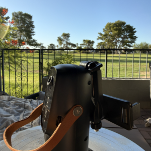 XO-SS20 auto face-tracking phone mount on a tabletop outdoors